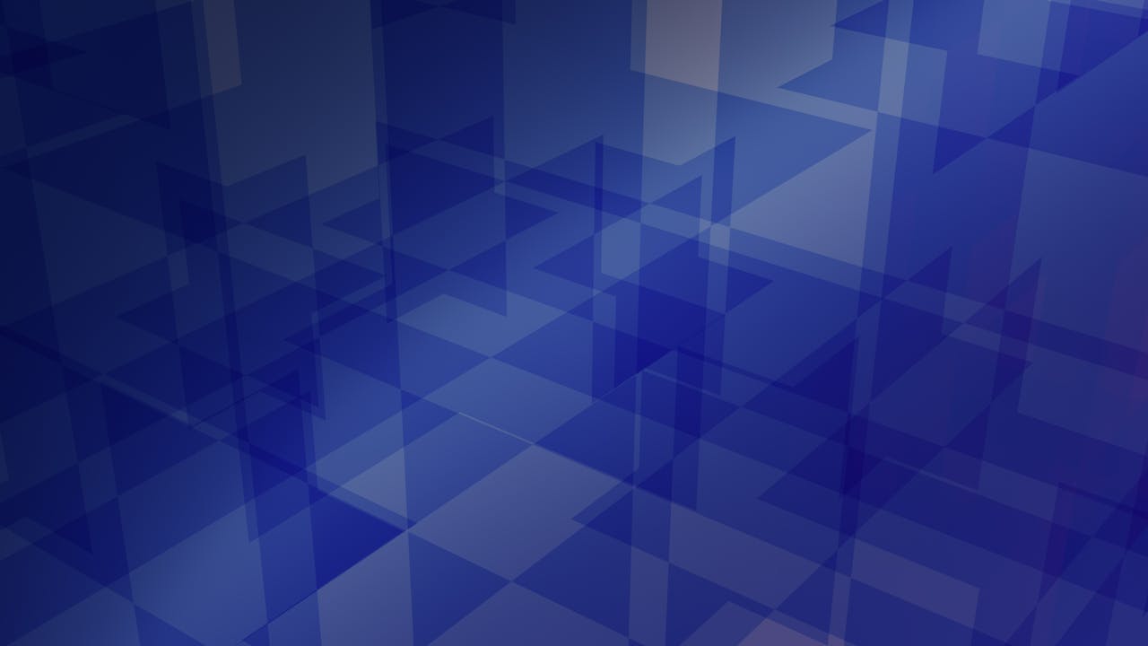 Abstract blue geometric pattern with layered triangles for creative design applications.